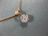ESTATE SMALL .25CT DIAMOND 18KT ROSE GOLD 3D FLOWER INVISIBLE FLOATING PENDANT