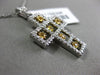 ESTATE .86CT WHITE & FANCY YELLOW DIAMOND 14K 2 TONE GOLD FLOATING CROSS PENDANT