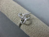 ESTATE .12CT DIAMOND 14KT WHITE GOLD 3D FLOWER LOVE KNOT FUN FRIENDSHIP RING