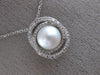 ESTATE .18CT DIAMOND & AAA SOUTH SEA PEARL 14KT WHITE GOLD 3D LOVE KNOT PENDANT