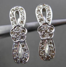 ESTATE .49CT DIAMOND 14KT WHITE GOLD 3D FLOWER BOW ELONGATED HUGGIE EARRINGS