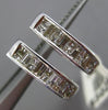 ESTATE .62CT PRINCESS & BAGUETTE DIAMOND 14K WHITE GOLD OVAL HUGGIE EARRINGS 3mm