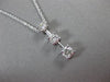 ESTATE LARGE .66CT ROUND DIAMOND 14KT WHITE GOLD 3 STONE FLOATING PENDANT #16660