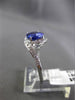 ESTATE WIDE 2.52CT DIAMOND & TANZANITE 18KT WHITE GOLD INFINITY ENGAGEMENT RING