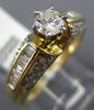 ESTATE 1.20CT ROUND & BAGUETTE DIAMOND 14KT YELLOW GOLD CLASSIC ENGAGEMENT RING