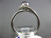 ESTATE .05CT ROUND DIAMOND & AAA TAHITIAN PEARL 18KT WHITE GOLD SWIRL LOVE RING