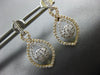 ESTATE .88CT DIAMOND 18KT WHITE & YELLOW GOLD FLOWER INFINITY TEAR DROP EARRINGS