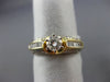 ESTATE 1.20CT ROUND & BAGUETTE DIAMOND 14KT YELLOW GOLD CLASSIC ENGAGEMENT RING