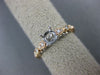 ESTATE .20CT DIAMOND 14KT WHITE & ROSE GOLD OPEN FILIGREE FLOWER ENGAGEMENT RING