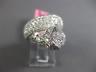 ESTATE LARGE 4.68CT DIAMOND & AAA EMERALD 18KT WHITE GOLD PAVE PANTHER FUN RING