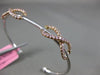 ESTATE .87CT WHITE & PINK DIAMOND 18K WHITE & ROSE GOLD INFINITY BANGLE BRACELET
