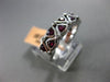 ESTATE .87CT DIAMOND & AAA RUBY 14KT WHITE GOLD TRIANGLE ETOILE DOUBLE ROW RING