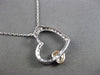 ESTATE .25CT DIAMOND 14KT TWO TONE GOLD FLOATING DOUBLE HEART PENDANT & CHAIN