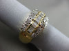 ESTATE WIDE 1CT ROUND & BAGUETTE DIAMOND 14KT YELLOW GOLD FLOWER BUTTERFLY RING