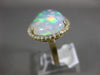ESTATE EXTRA LARGE 8.13CT DIAMOND & AAA OPAL 14KT YELLOW GOLD CLASSIC HALO RING