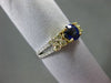 .85CT WHITE & FANCY YELLOW DIAMOND & SAPPHIRE 18KT TWO TONE GOLD ENGAGEMENT RING
