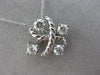 ESTATE .75CT DIAMOND 14K WHITE GOLD 3D 4 STONE CRISS CROSS LOVE FLOATING PENDANT