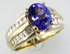 3.95CT DIAMOND & AAA TANZANITE 14KT YELLOW GOLD OVAL & BAGUETTE ENGAGEMENT RING