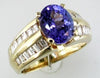 3.95CT DIAMOND & AAA TANZANITE 14KT YELLOW GOLD OVAL & BAGUETTE ENGAGEMENT RING