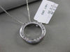 ESTATE .25CT DIAMOND 14KT WHITE GOLD 9 STONE CIRCLE OF LIFE FLOATING PENDANT