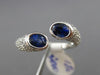 ESTATE 1.72CT DIAMOND & AAA OVAL SAPPHIRE 18KT WHITE GOLD CRISS CROSS LOVE RING