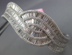 WIDE 6.72CT ROUND & BAGUTTE DIAMOND 18KT WHITE GOLD 3D INFINITY MULTI ROW BANGLE