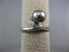 ESTATE .05CT ROUND DIAMOND & AAA TAHITIAN PEARL 18KT WHITE GOLD SWIRL LOVE RING