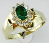 .76CT DIAMOND & AAA EMERALD 14KT YELLOW GOLD OVAL & ROUND FLOWER LOVE KNOT RING