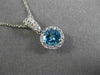 ESTATE 1.06CT DIAMOND & AAA BLUE TOPAZ 14KT WHITE GOLD PAVE HALO ROUND PENDANT