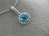 ESTATE .63CT DIAMOND & AAA BLUE TOPAZ 14KT WHITE GOLD CLASSIC HALO ROUND PENDANT