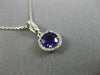 ESTATE .58CT DIAMOND & AAA AMETHYST 14KT WHITE GOLD CLASSIC HALO ROUND PENDANT