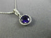 ESTATE .58CT DIAMOND & AAA AMETHYST 14KT WHITE GOLD CLASSIC HALO ROUND PENDANT