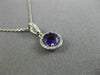 ESTATE .58CT DIAMOND & AAA AMETHYST 14KT WHITE GOLD CLASSIC HALO ROUND PENDANT