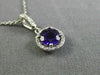 ESTATE .58CT DIAMOND & AAA AMETHYST 14KT WHITE GOLD CLASSIC HALO ROUND PENDANT