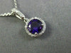 ESTATE .58CT DIAMOND & AAA AMETHYST 14KT WHITE GOLD CLASSIC HALO ROUND PENDANT