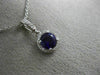 ESTATE .58CT DIAMOND & AAA AMETHYST 14KT WHITE GOLD CLASSIC HALO ROUND PENDANT