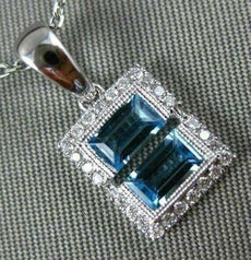 .81CT DIAMOND & AAA BLUE TOPAZ 14KT WHITE GOLD RECTANGULAR ILLUSION LOVE PENDANT