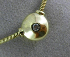 ESTATE .07CT DIAMOND 14KT YELLOW GOLD SOLITAIRE BEZEL FLOATING PENDANT #6973