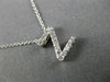 .14CT ROUND DIAMOND 14KT WHITE GOLD 3D CLASSIC INITIAL FLOATING PENDANT #9287