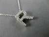 .16CT ROUND DIAMOND 14KT WHITE GOLD CLASSIC "R" INITIAL FLOATING PENDANT #19148