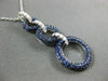 2.16CT DIAMOND & SAPPHIRE 18KT WHITE & BLACK GOLD CIRCULAR JOURNEY LOVE PENDANT
