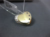 ESTATE .04CT DIAMOND 14KT TWO TONE GOLD FOUR STONE ETOILE HEART FLOATING PENDANT