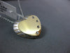 ESTATE .04CT DIAMOND 14KT TWO TONE GOLD FOUR STONE ETOILE HEART FLOATING PENDANT