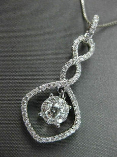 ANTIQUE .67CT ROUND DIAMOND 18KT WHITE GOLD INFINITY FLOATING PENDANT & CHAIN