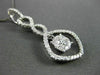 ANTIQUE .67CT ROUND DIAMOND 18KT WHITE GOLD INFINITY FLOATING PENDANT & CHAIN