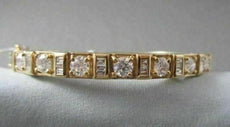 ANTIQUE WIDE 3.0CTW DIAMOND 18KT YELLOW GOLD BAGUETTE AND ROUND BANGLE