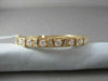 ANTIQUE WIDE 3.0CTW DIAMOND 18KT YELLOW GOLD BAGUETTE AND ROUND BANGLE