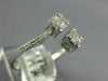 .39CT DIAMOND 18K WHITE GOLD 3D ROUND & BAGUETTE SQUARE CLUSTER CRISS CROSS RING