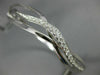 .56CT DIAMOND 18KT WHITE GOLD 3D MULTI ROW CRISS CROSS X LOVE BANGLE BRACELET