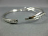 .56CT DIAMOND 18KT WHITE GOLD 3D MULTI ROW CRISS CROSS X LOVE BANGLE BRACELET